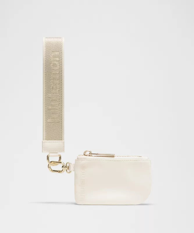 LuluLemon Dual Pouch Wristlet Metallic Wordmark - Light Ivory