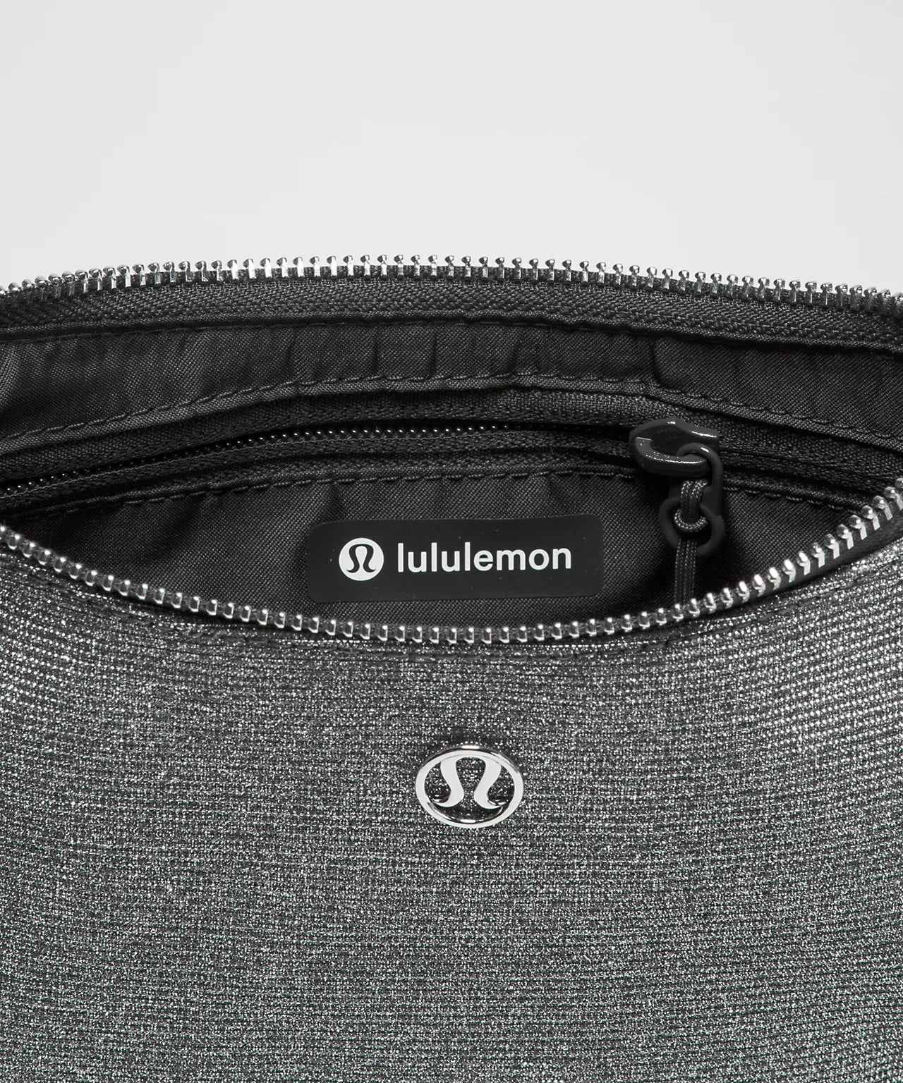 Lululemon City Essentials Mini Shoulder Bag 1L
Glitter - Dark Silver/Graphite Grey/Silver