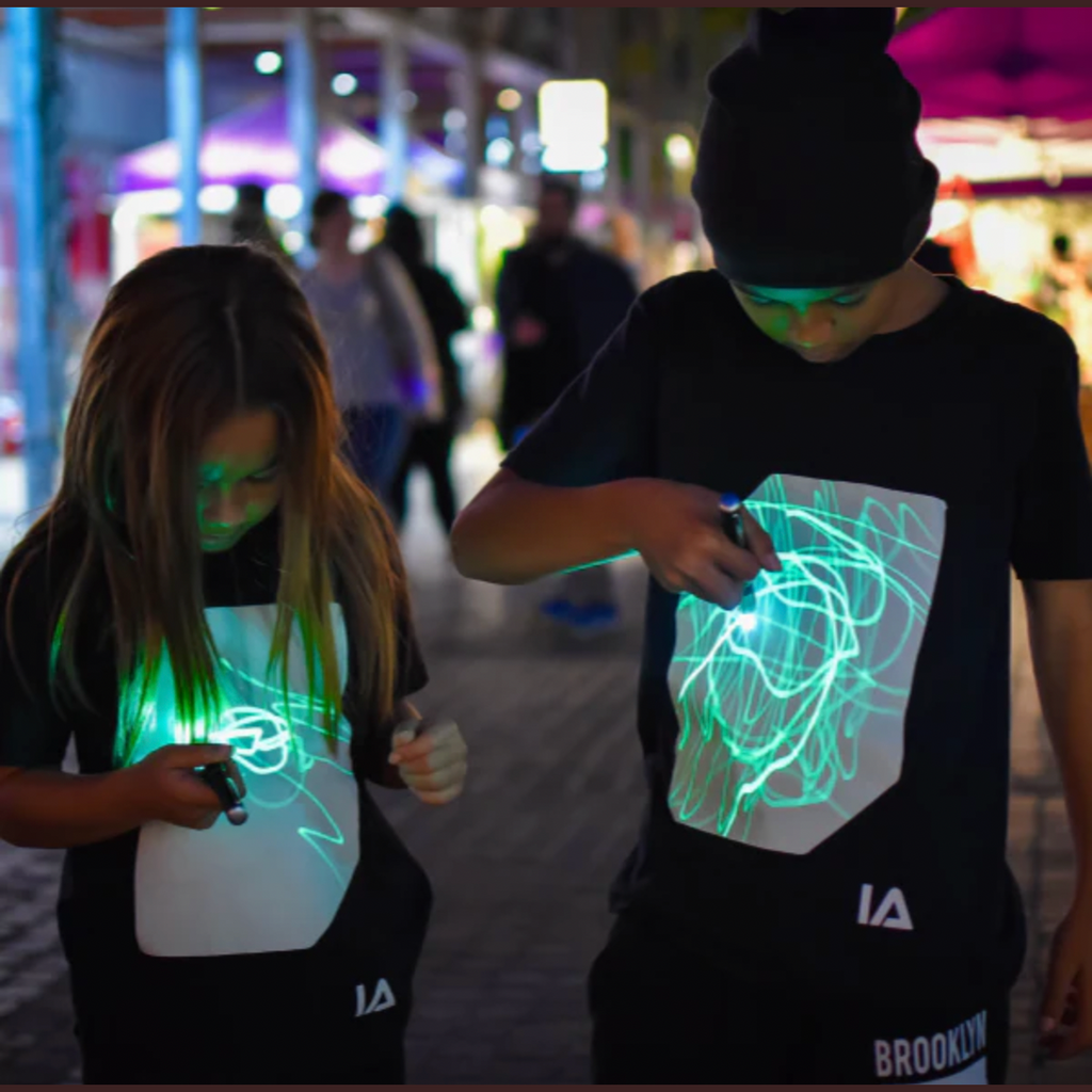 Illuminated Apparel Interactive Glow In The Dark T-Shirt - White & Pink Glow