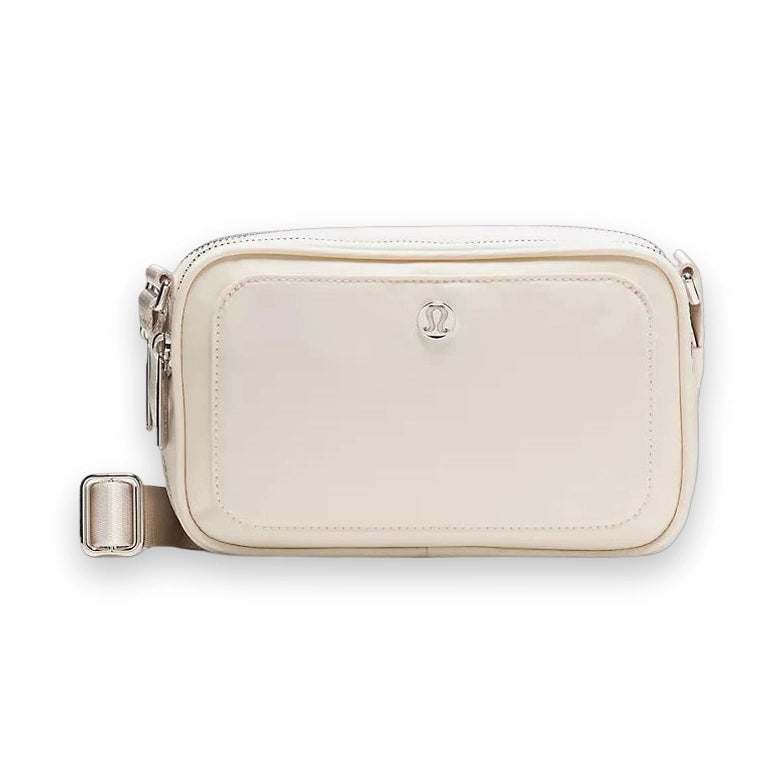LuluLemon Crossbody Camera Bag 2L- Colour Light Ivory/Silver 