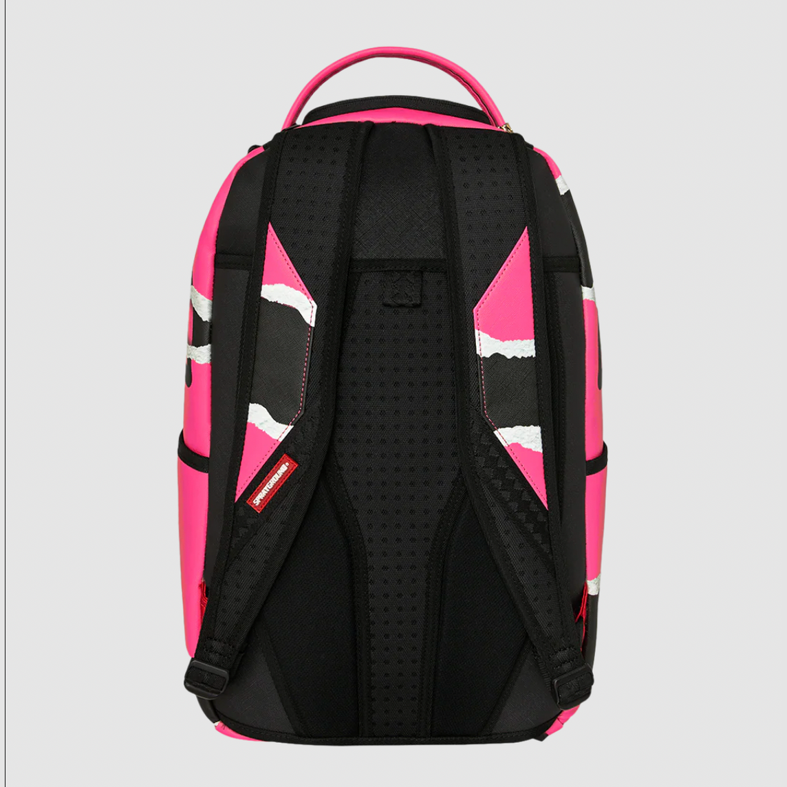 A backpack shown from the back, featuring a black perforated mesh back panel with bright pink and black geometric side panels and a pink top handle, set against a light gray background.